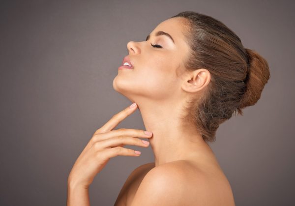 beauty woman skincare profile studio background dermatology cosmetics thinking foundation calm relaxing face model young person with minimal makeup flawless results scaled e1767451650371 aesthetic medical spa treatment McLean VA En Santé Med