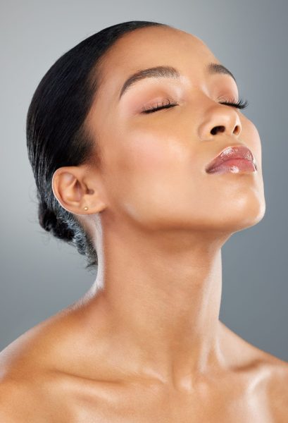 relax makeup calm woman with skincare facial glow studio grey background dermatology treatment elegant girl face confident model with cosmetics beauty transformation results scaled e1767460490285 aesthetic medical spa treatment McLean VA En Santé Med
