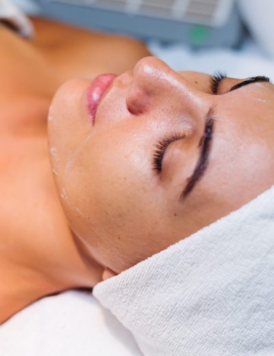 young woman lying cosmetologist s table rejuvenation procedure scaled e1767662728256 aesthetic medical spa treatment McLean VA En Santé Med