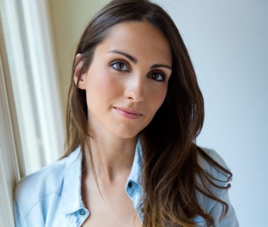 beautiful woman drinking coffee morning near window scaled e1767669486957 aesthetic medical spa treatment McLean VA En Santé Med