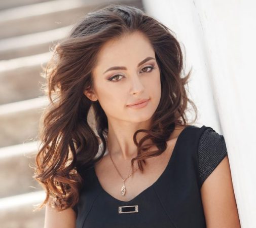 pretty young woman portrait outdoor scaled e1767670935113 aesthetic medical spa treatment McLean VA En Santé Med