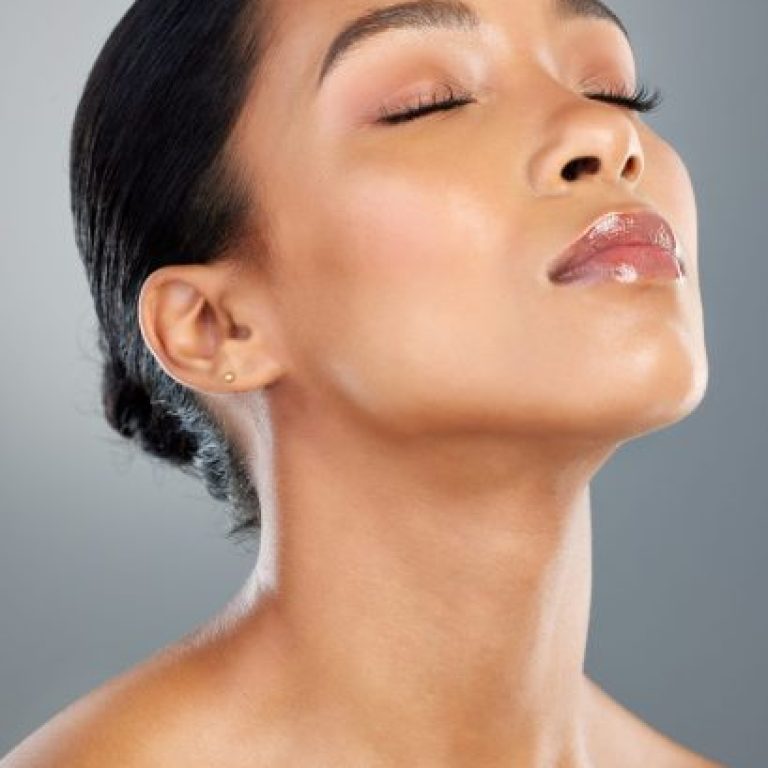 relax makeup calm woman with skincare facial glow studio grey background dermatology treatment elegant girl face confident model with cosmetics beauty transformation results scaled e1767460490285 aesthetic medical spa treatment McLean VA En Santé Med