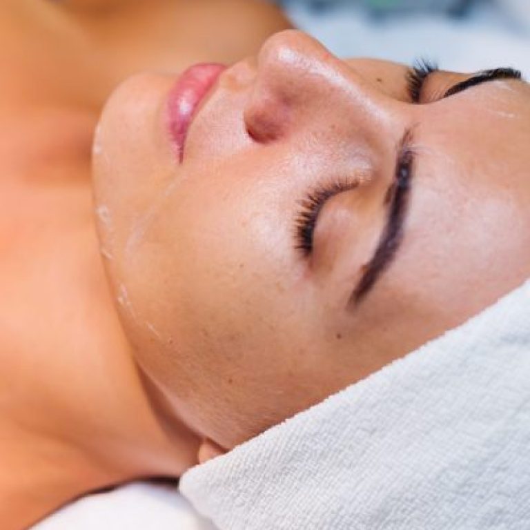 young woman lying cosmetologist s table rejuvenation procedure scaled e1767662728256 aesthetic medical spa treatment McLean VA En Santé Med